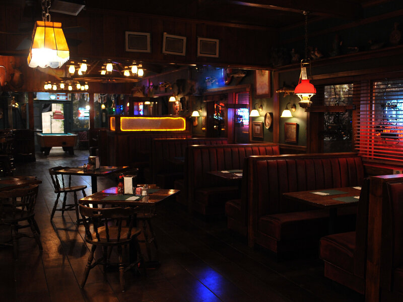 Dimly Lit Restaurant Interior — Brown