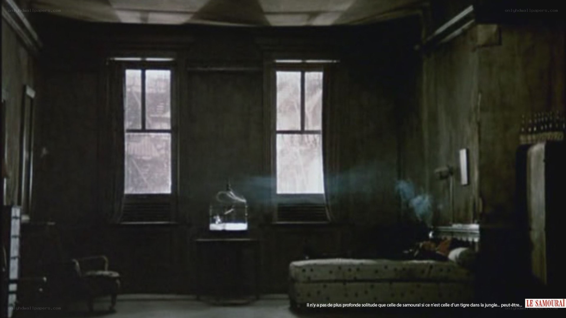 dimly lit room with windows