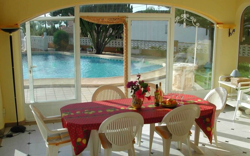 Dining area with pool view