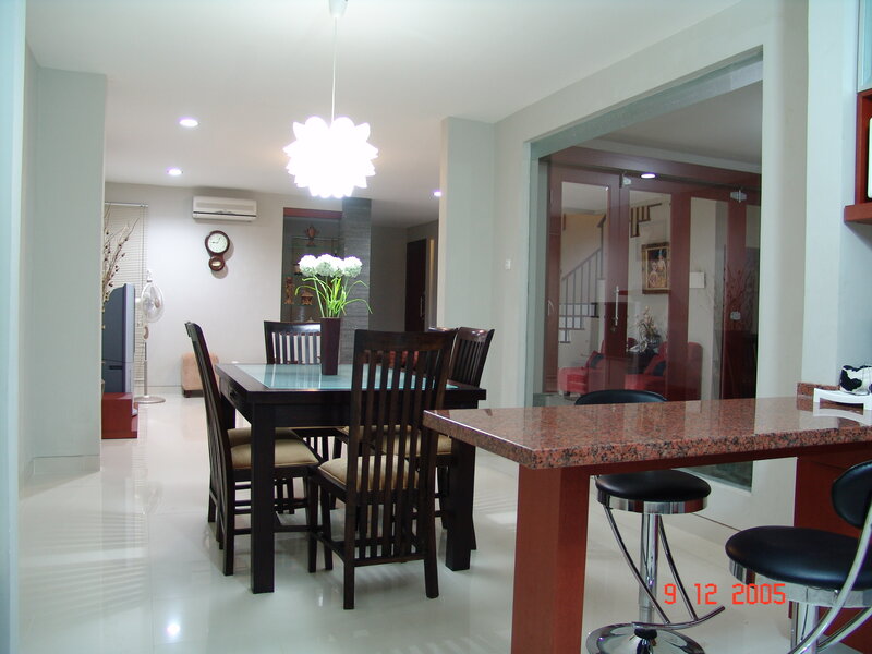 Dining area with table and bar