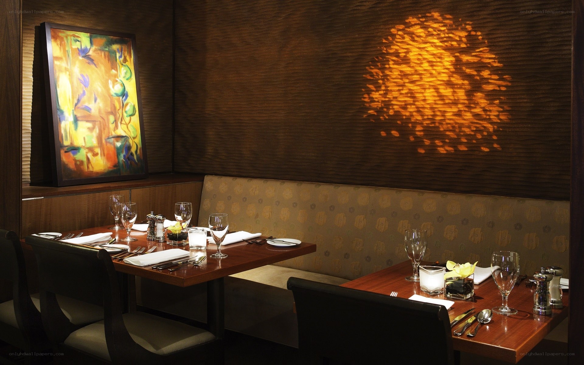 Dining booth with art and lighting