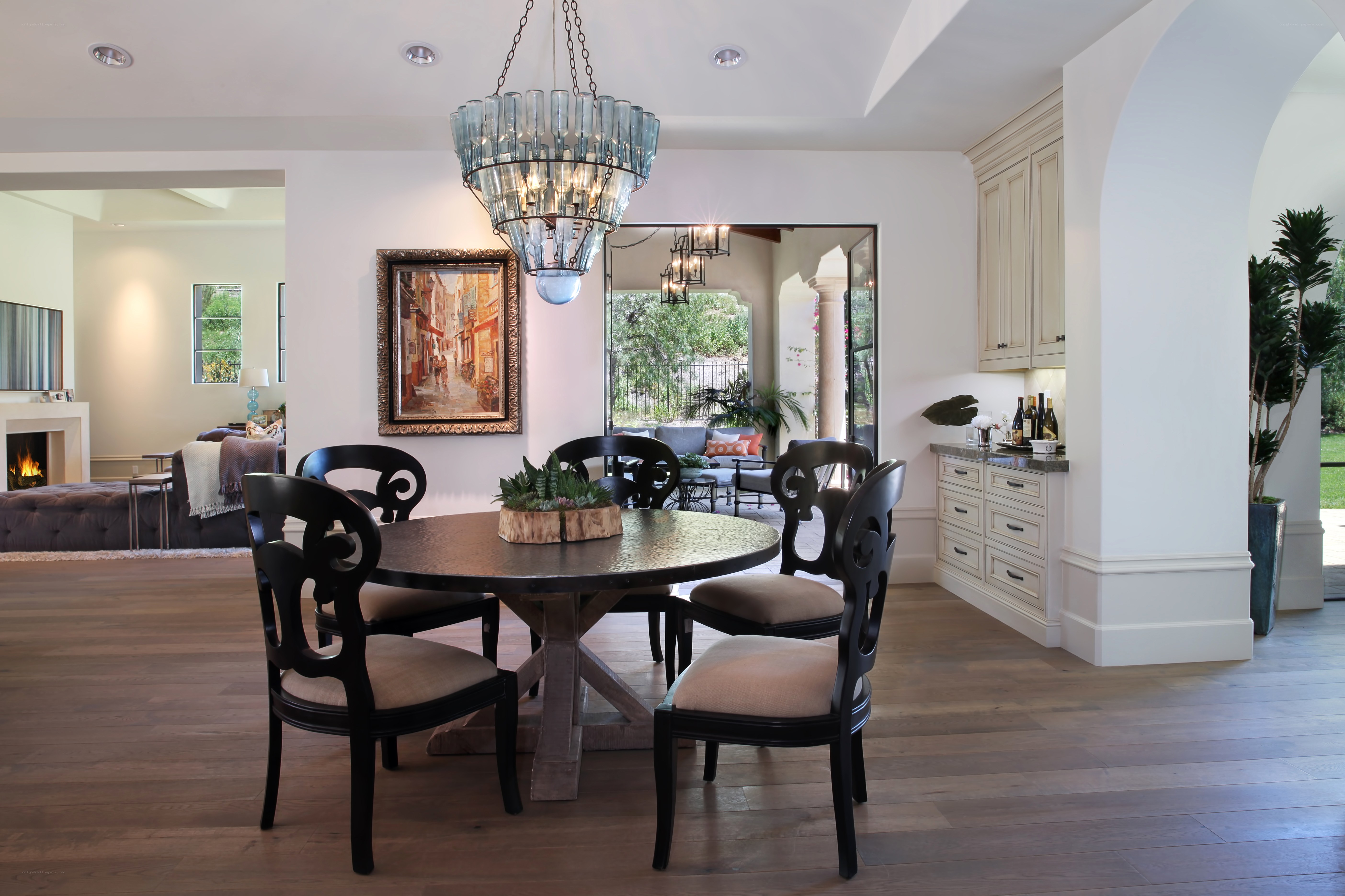 Dining room with chandelier and artwork