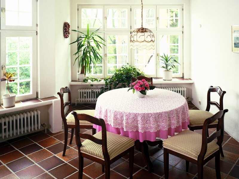 Dining room with lace tablecloth