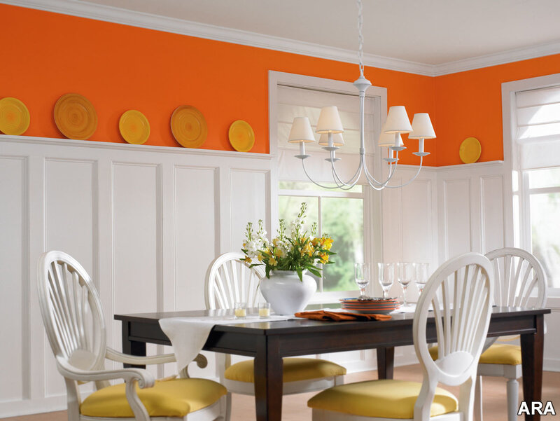 Dining room with orange walls