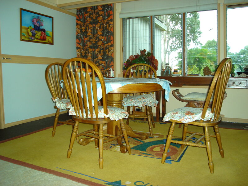 Dining room with wooden table and chairs