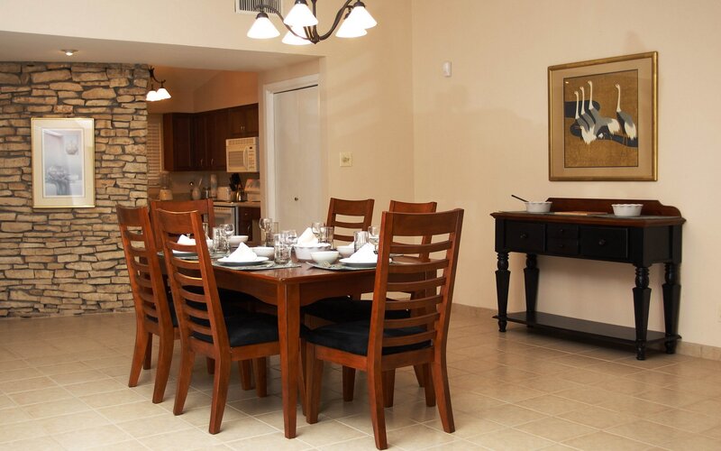 Dining room with wooden table and chairs