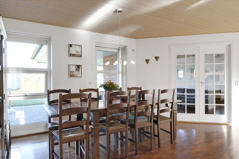 Dining room with wooden table and chairs