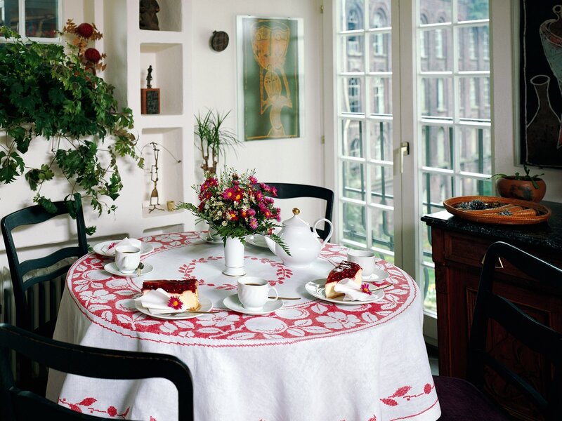 Dining table with tea and cake