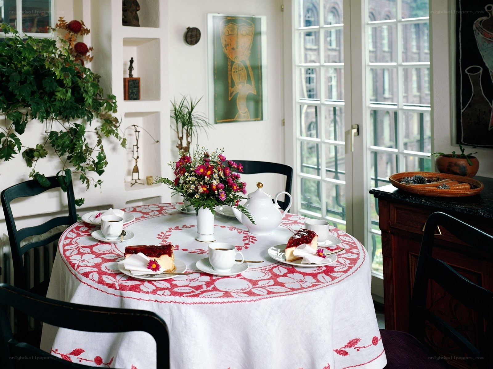 Dining table with tea and cake