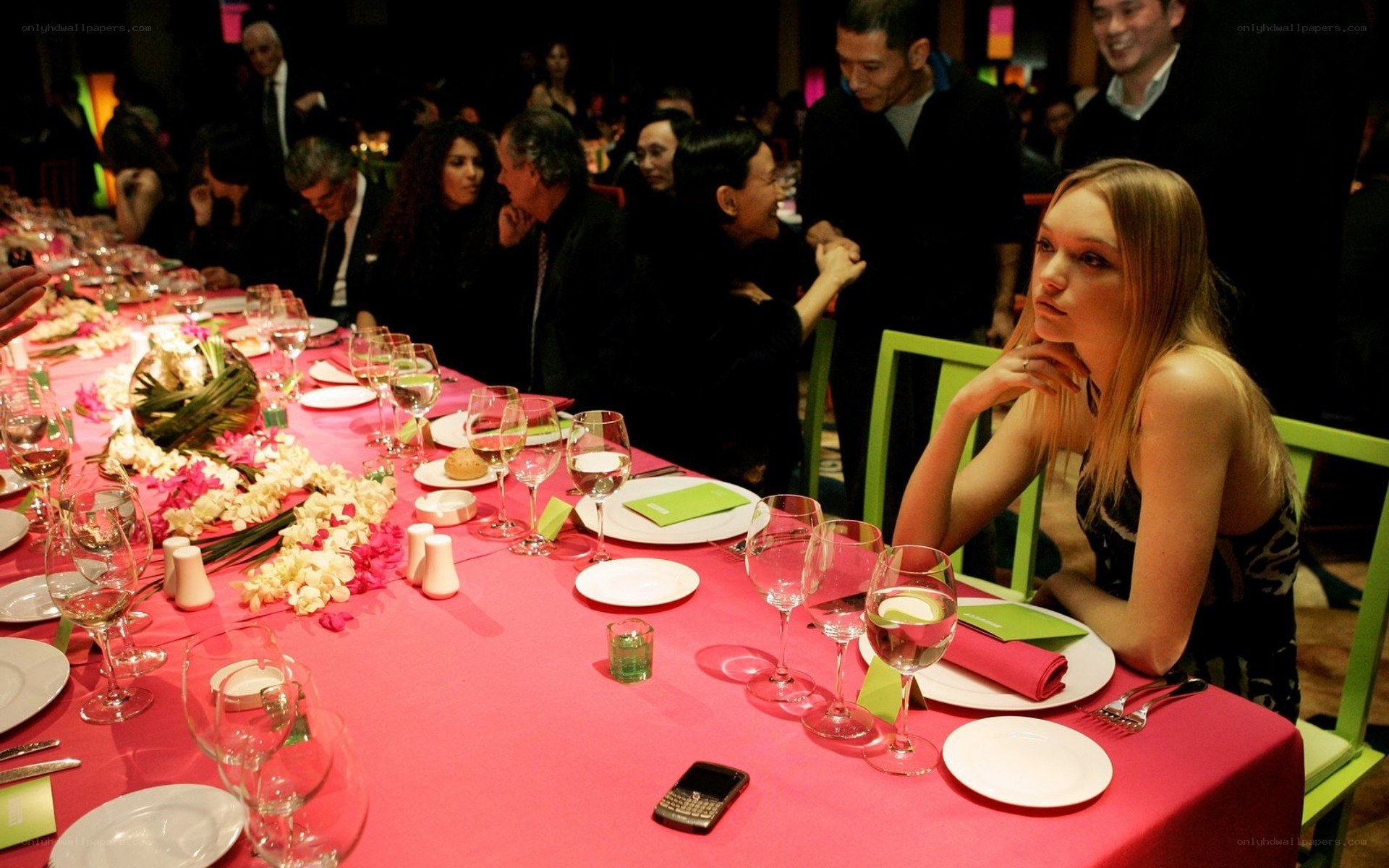 Dinner party with floral centerpiece