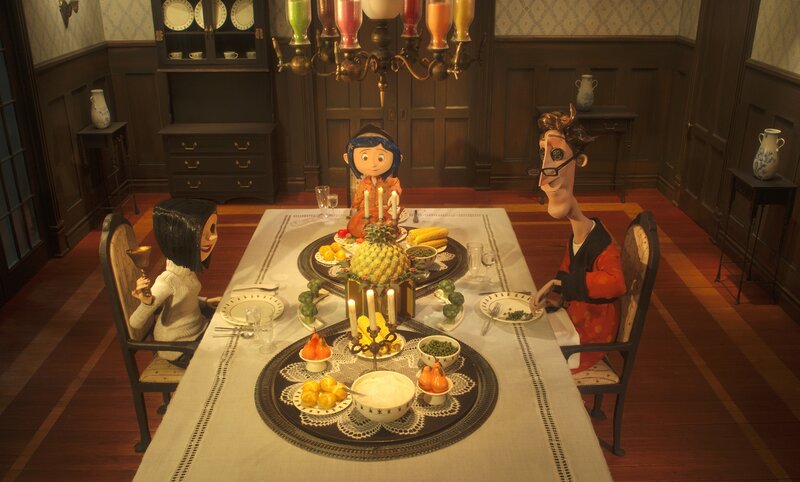 dinner scene with puppets