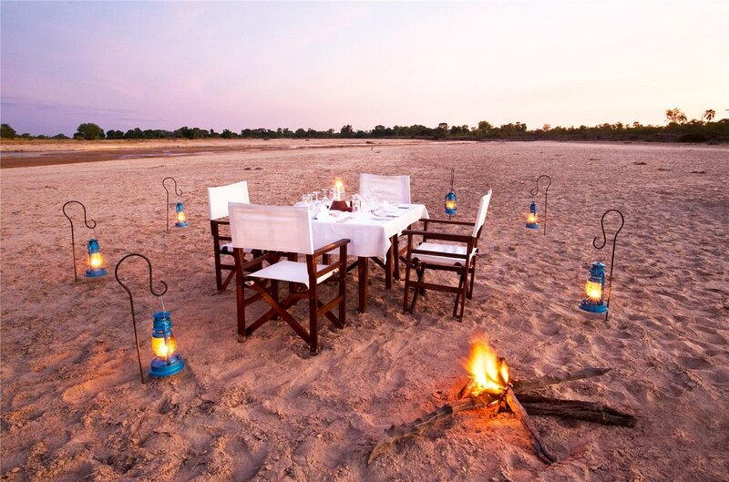 Dinner Table on Beach — Orange, Serene, Sunset, Photograph, Lanterns, Fire