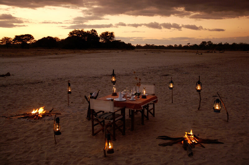 Dinner Table on Beach — Orange, Serene, Sunset