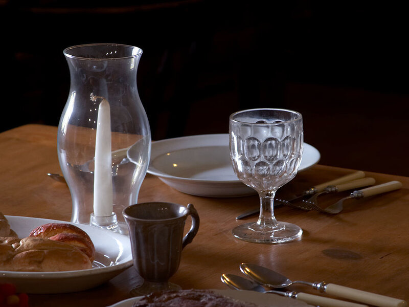 Dinner table setting with candle