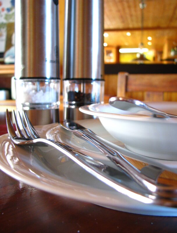 Dinner table setting with salt and pepper