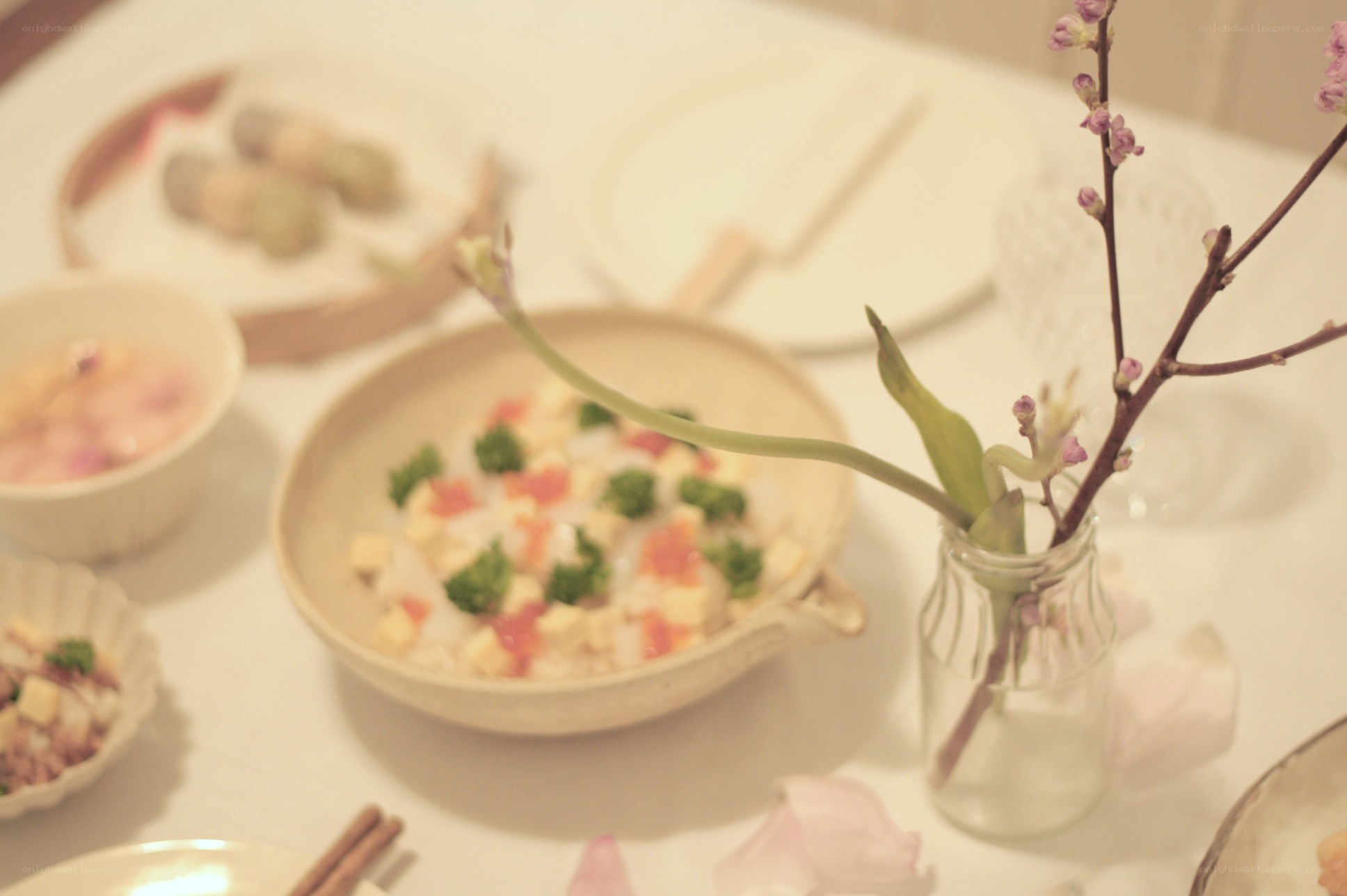 dinner table with food and flowers