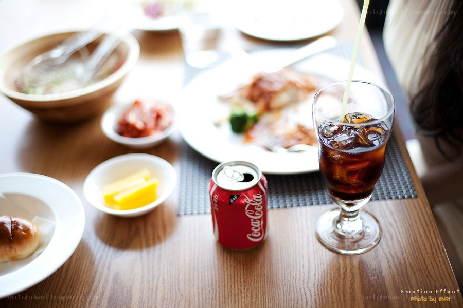 Dinner table with soda and food