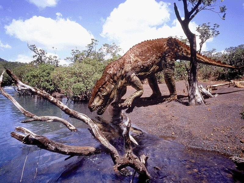 Dinosaur drinking from a river