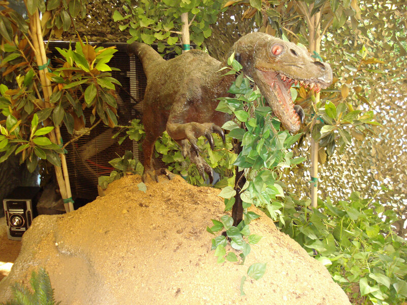Dinosaur exhibit in foliage