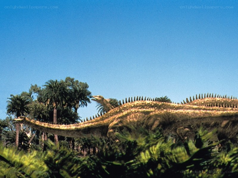 Dinosaur in prehistoric forest