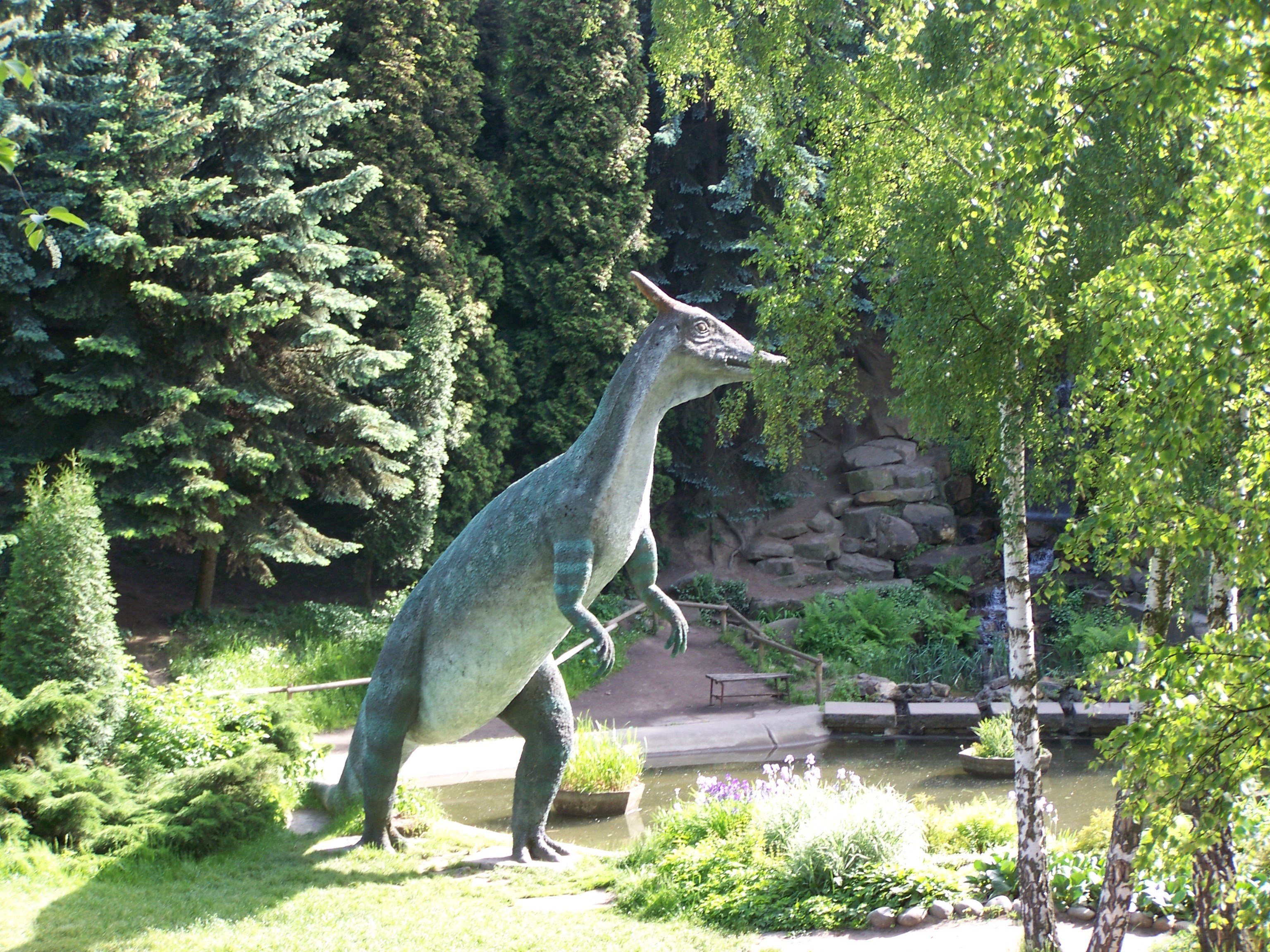 Dinosaur statue in a park