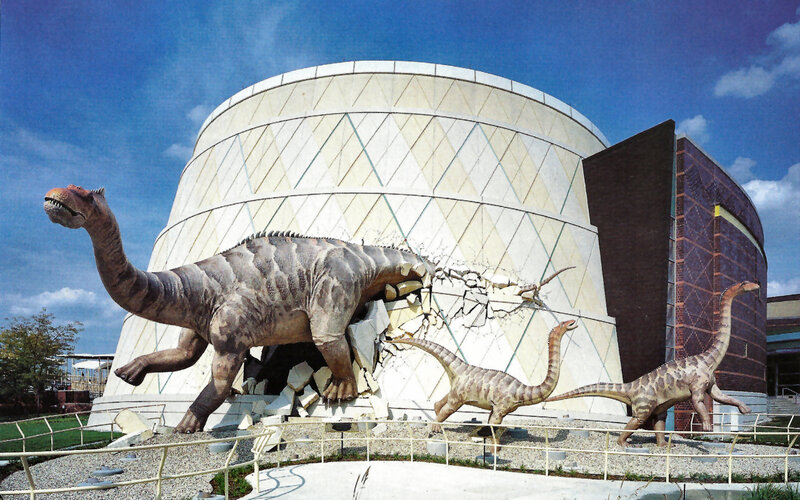 Dinosaur Statues Outside Building