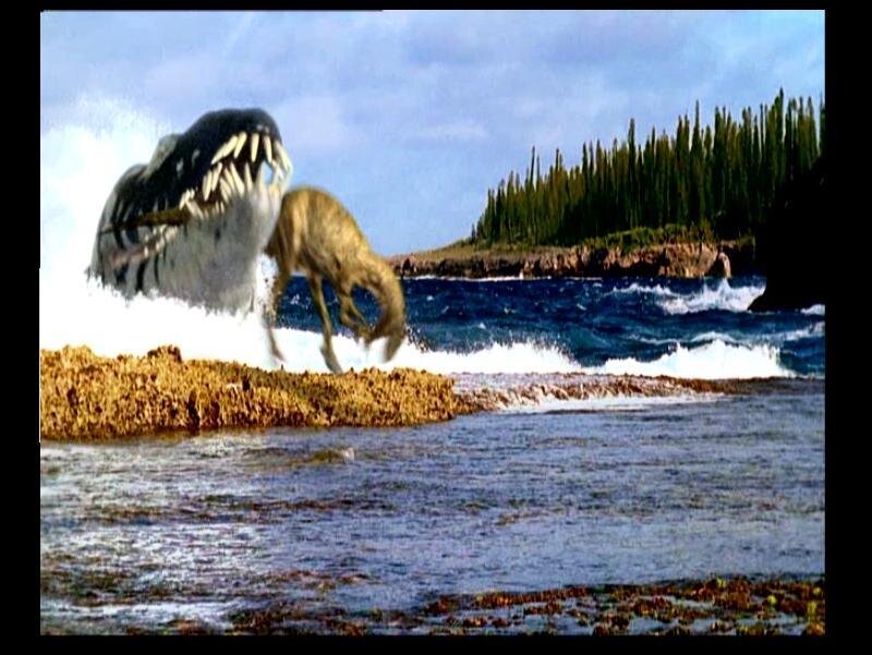Dinosaurs fighting on a beach