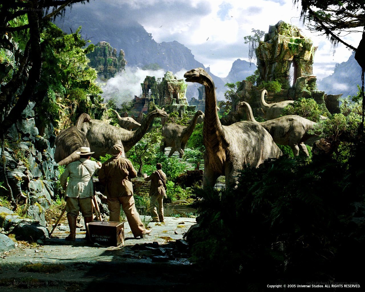 Dinosaurs in a jungle landscape