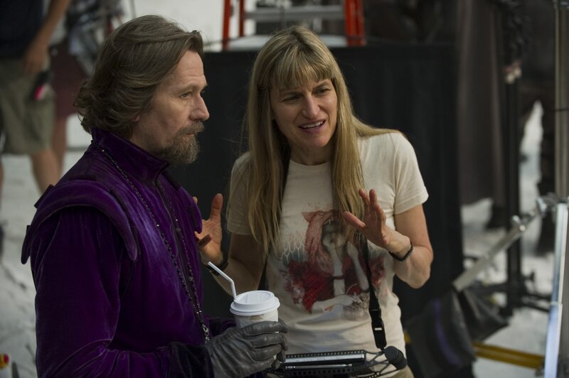 Director on film set with actor