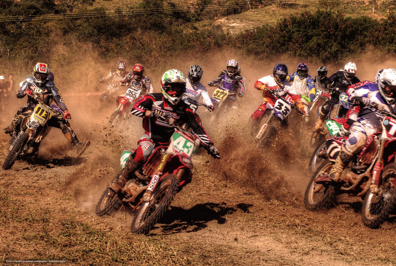Dirt bike racers in action