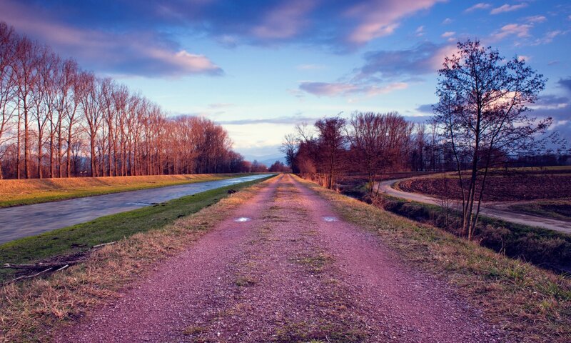 Dirt Path Beside Canal — Blue