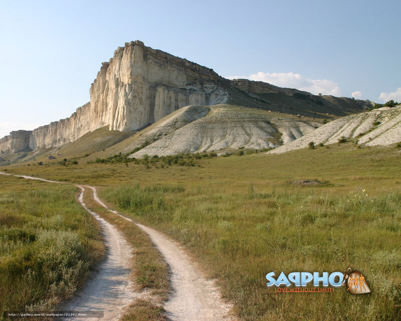 Dirt path leading to cliffs