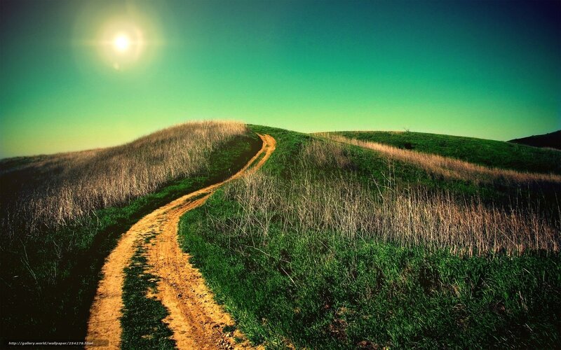 Dirt path on a sunny hill