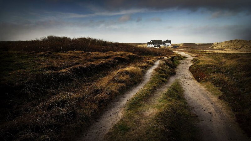 Dirt path to a remote cottage