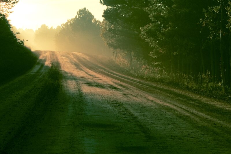 Dirt road at sunrise