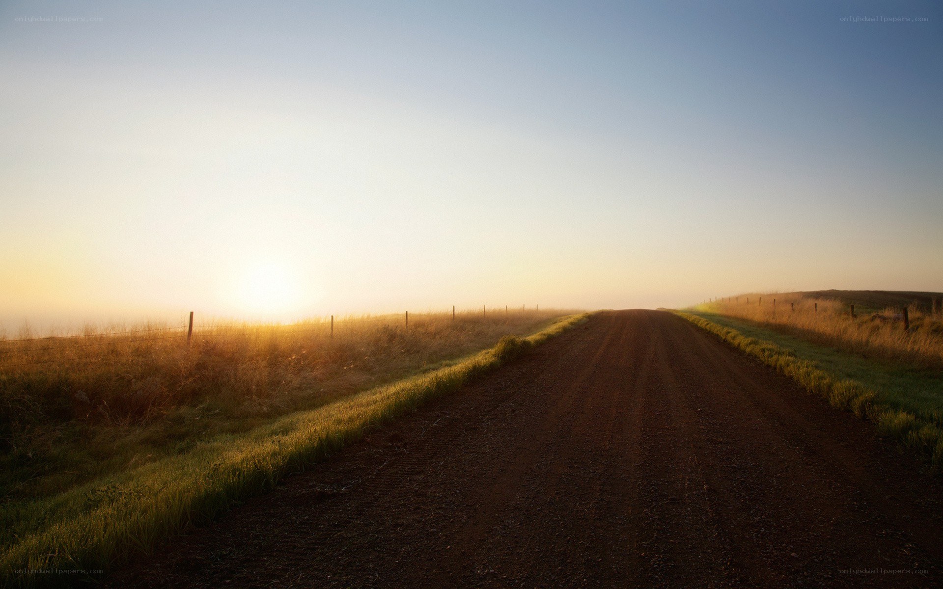 Dirt road at sunrise