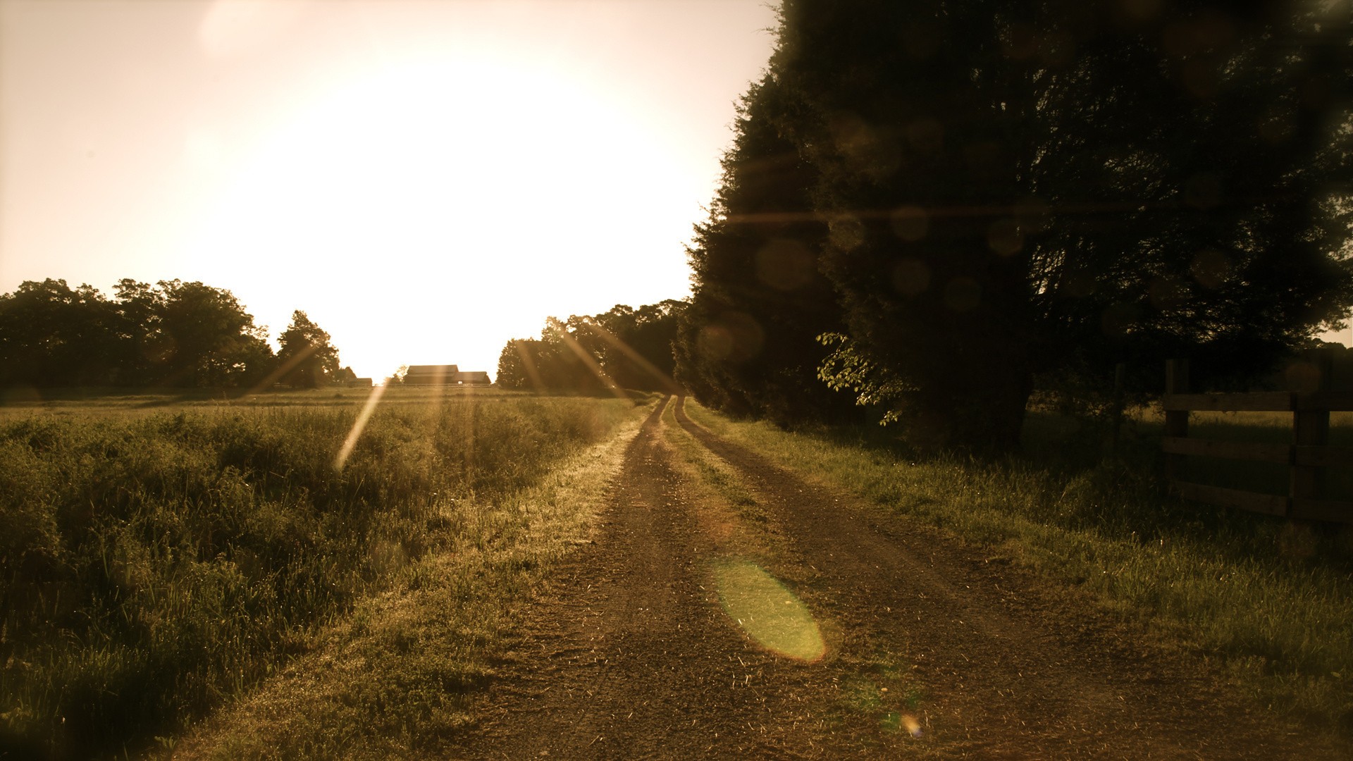Dirt road at sunset