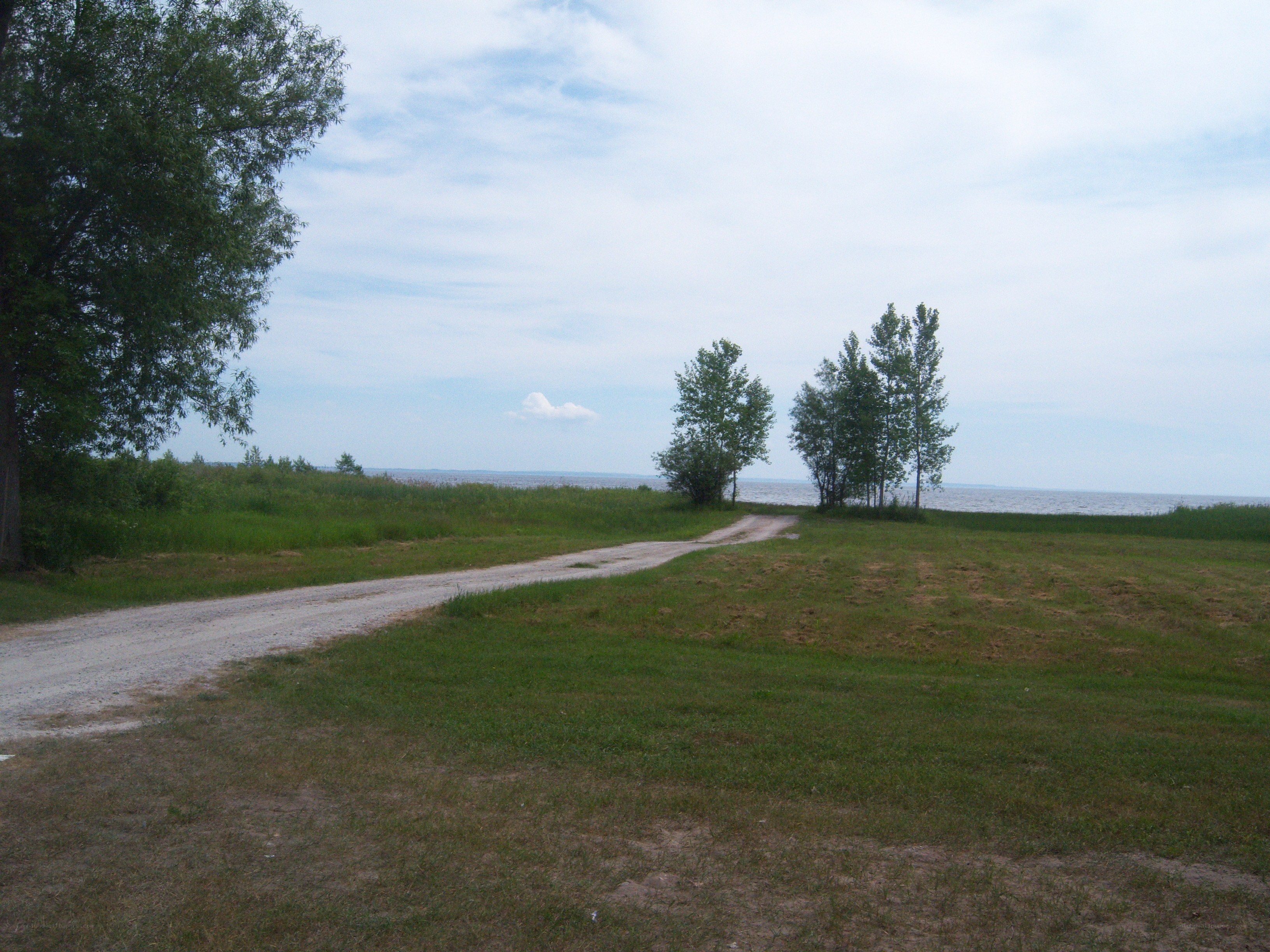 Dirt road by the lake