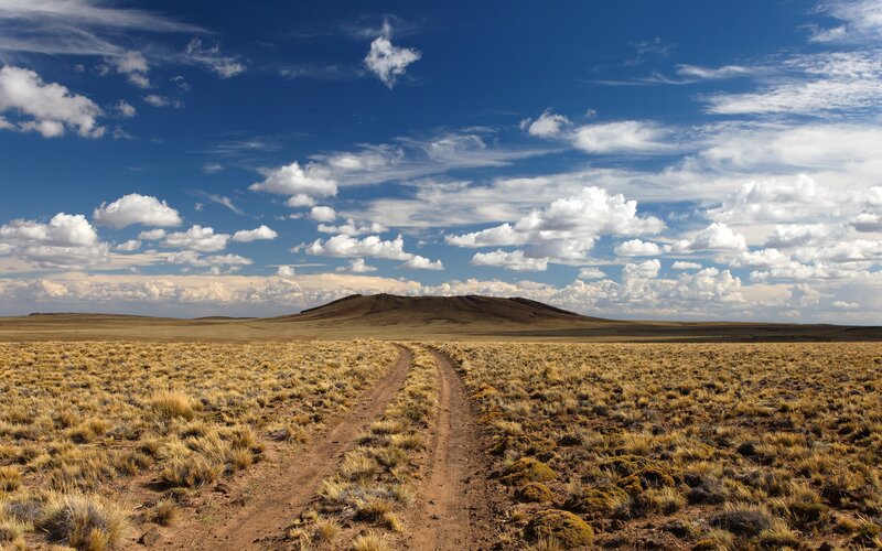 Dirt Road in Desert — Blue, Serene, Afternoon, Photograph