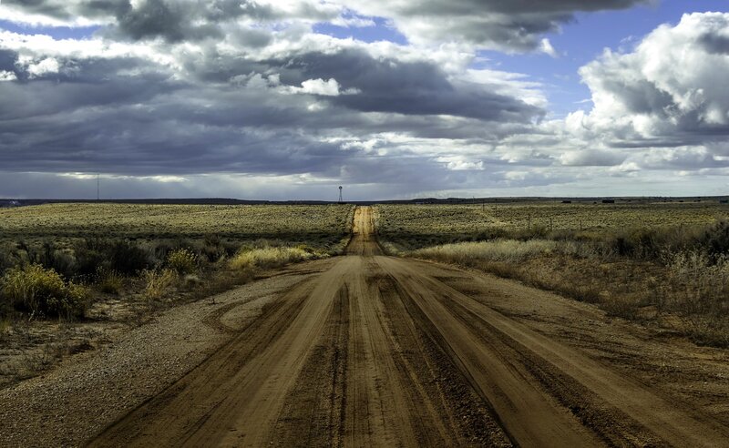 Dirt Road in Desert — Brown, Dramatic, Afternoon, Photograph