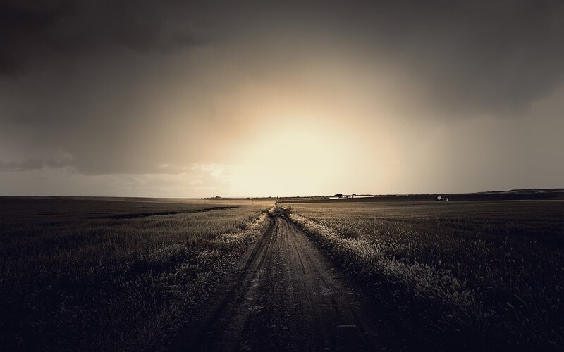 Dirt Road in Field — Brown, Dramatic, Sunset, Photograph, Sky, Tractor