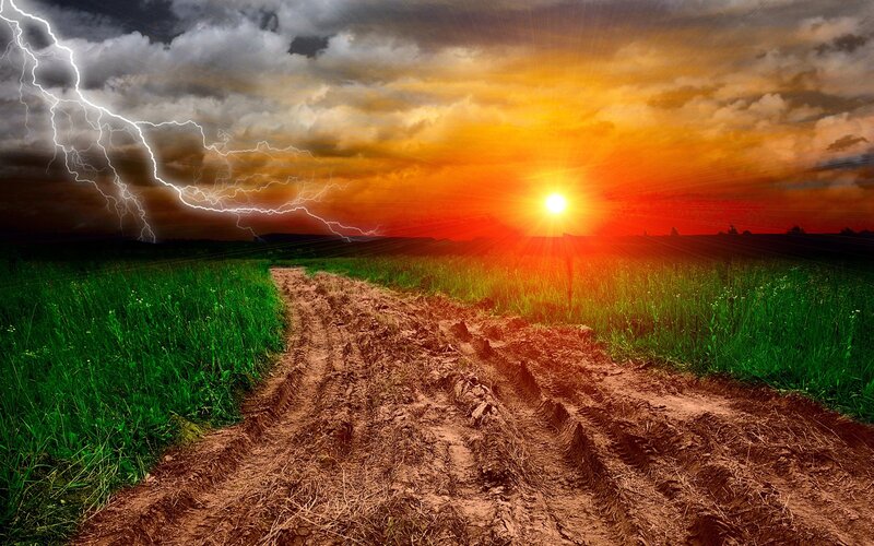 Dirt Road in Field — Green, Dramatic, Sunset, Photograph, Lightning, Sun