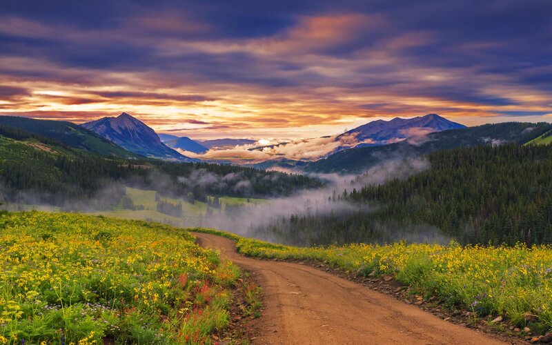 Dirt Road in Mountain Valley — Yellow, Serene, Sunset