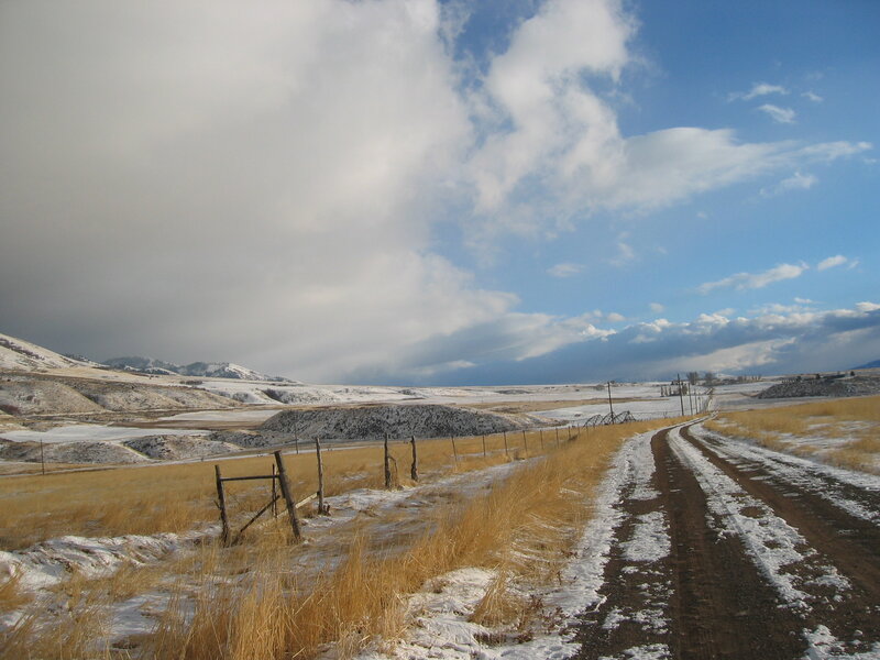 Dirt Road in Winter Landscape