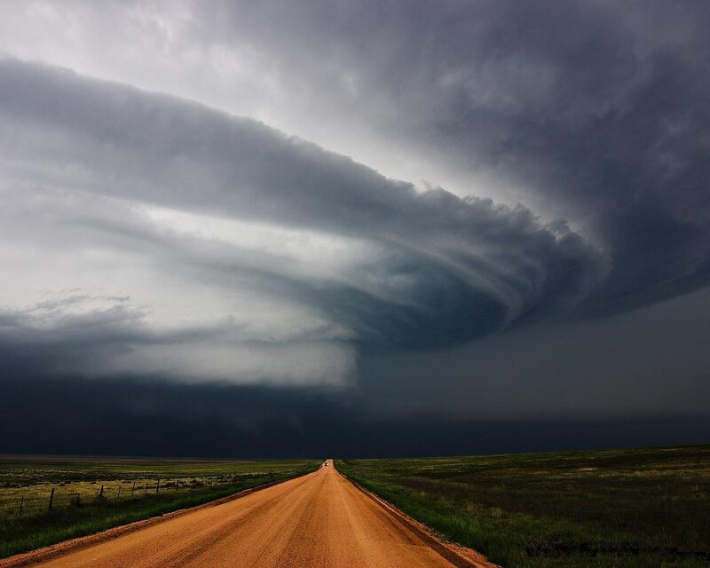 Dirt Road under Storm Cloud