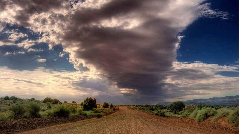 Dirt Road under Storm Clouds — Blue, Dramatic, Afternoon