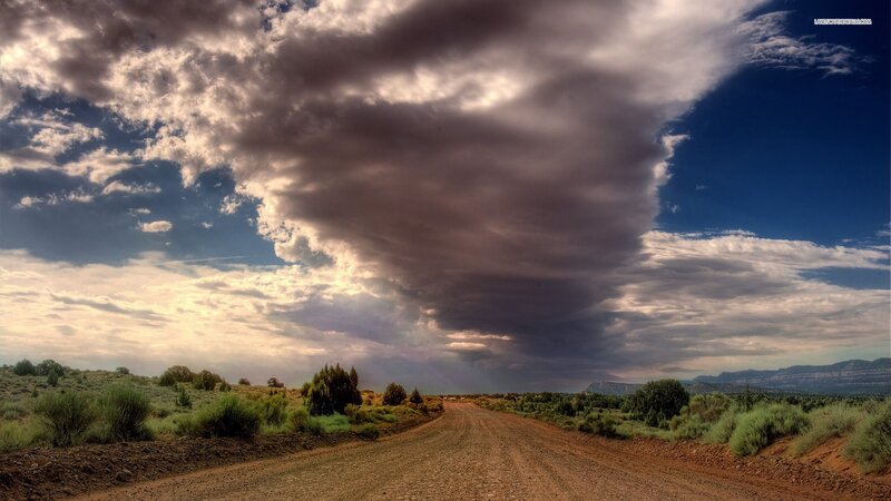 Dirt Road under Storm Clouds — Blue, Dramatic