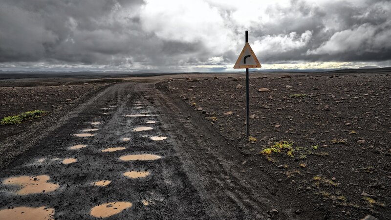 Dirt Road with Puddles