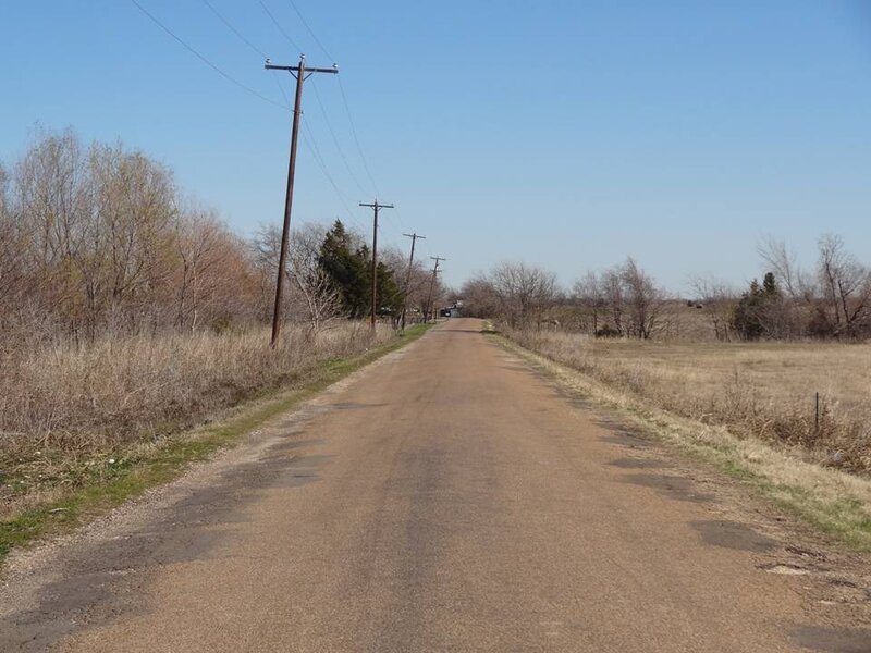 Dirt Road with Utility Poles