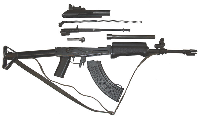 Disassembled assault rifle components